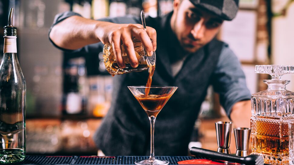 A Barkeeper mixing a Drink